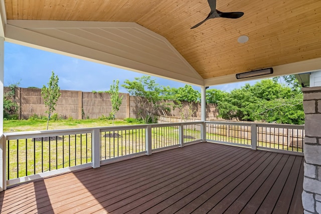 wooden deck featuring a ceiling fan