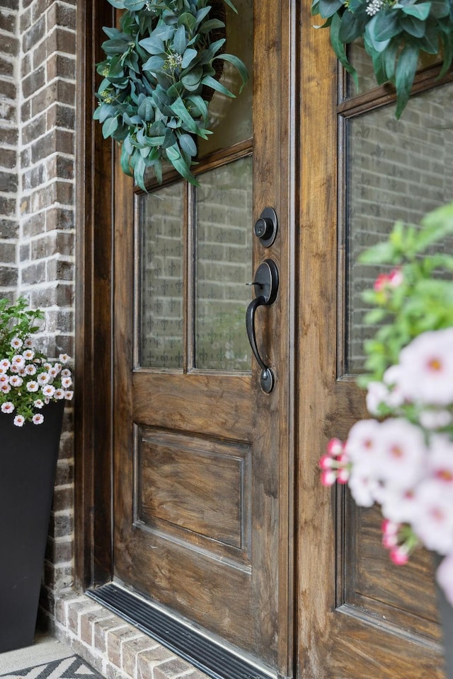 1567 Bunbury Dr, Thompsons Station, TN 37179 - doorway to property featuring brick siding
