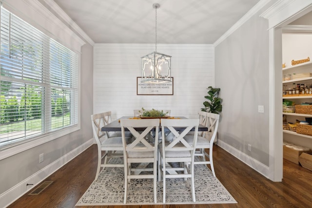 1567 Bunbury Dr, Thompsons Station, TN 37179 - dining room featuring a chandelier, wood finished floors, ornamental molding, and baseboards