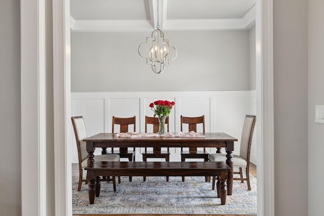 1567 Bunbury Dr, Thompsons Station, TN 37179 - dining area featuring a decorative wall, crown molding, a chandelier, and wainscoting