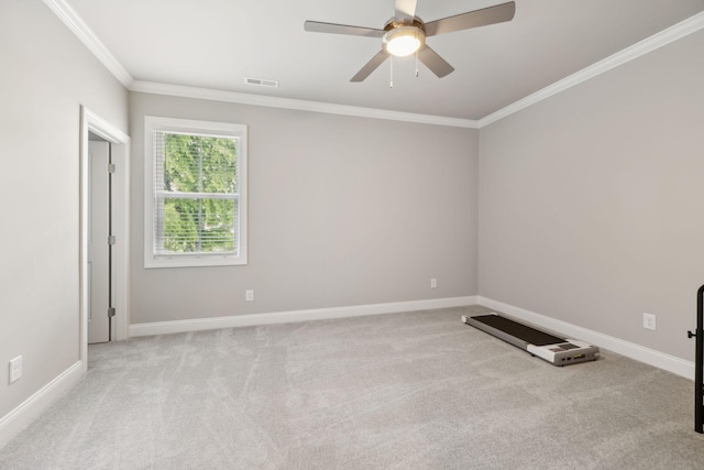 1567 Bunbury Dr, Thompsons Station, TN 37179 - spare room featuring crown molding, ceiling fan, carpet flooring, and baseboards