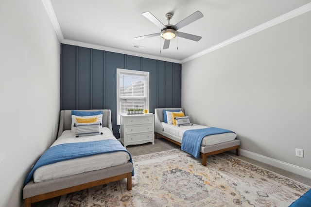 1567 Bunbury Dr, Thompsons Station, TN 37179 - carpeted bedroom featuring ornamental molding, a ceiling fan, and baseboards