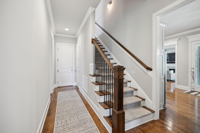 1567 Bunbury Dr, Thompsons Station, TN 37179 - stairway featuring ornamental molding, wood finished floors, baseboards, and recessed lighting
