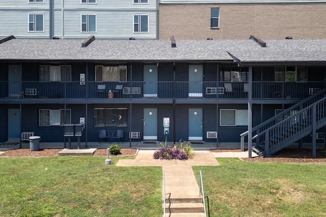 view of property featuring stairs