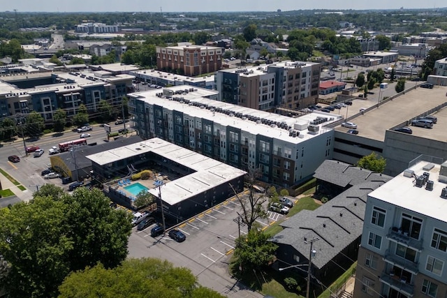view of urban area featuring a pool area