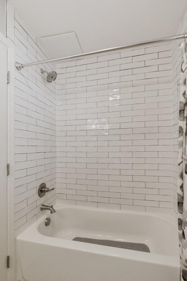 bathroom featuring shower / bath combination with curtain