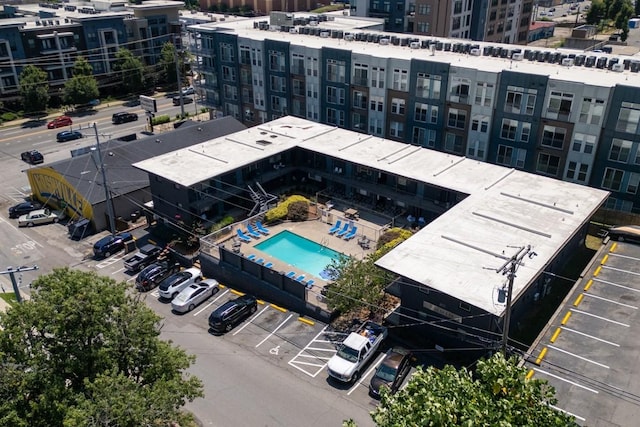 drone / aerial view of a pool