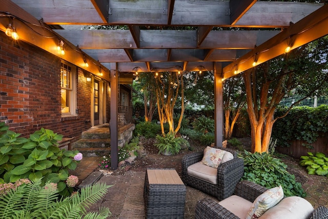 view of patio / terrace featuring fence and a pergola