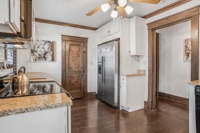 kitchen with appliances with stainless steel finishes, a ceiling fan, dark wood-style floors, white cabinets, and ornamental molding