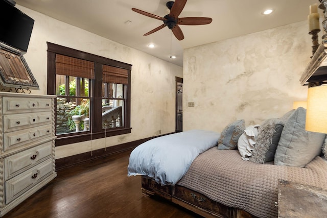 bedroom featuring wood finished floors, recessed lighting, a ceiling fan, and baseboards