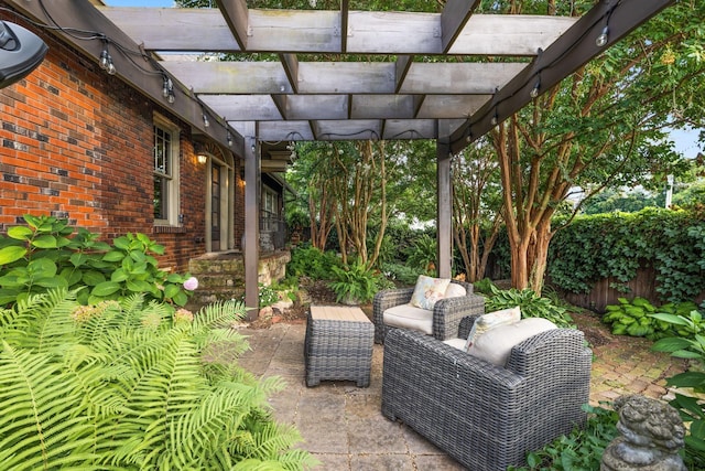 view of patio / terrace with fence and a pergola