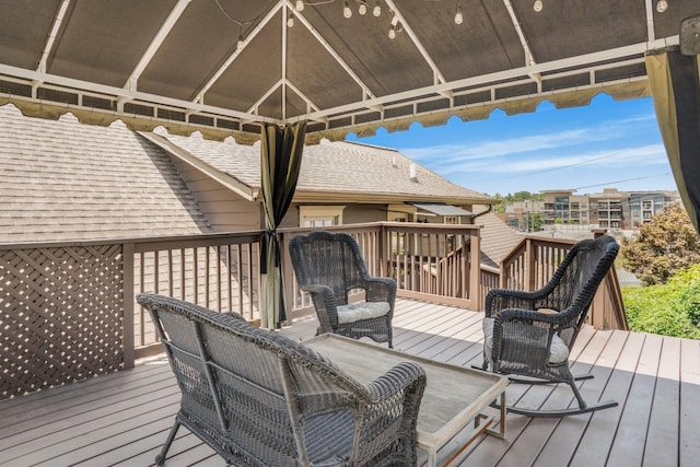 wooden terrace with a gazebo