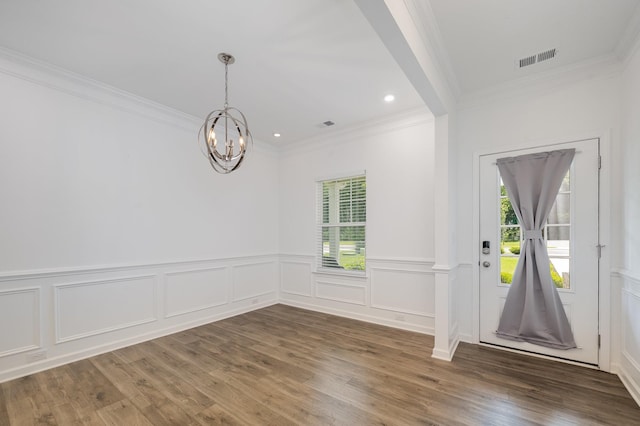 3628 Pelham Wood Dr, Murfreesboro, TN 37128 - foyer entrance featuring crown molding, a chandelier, wood finished floors, recessed lighting, and wainscoting