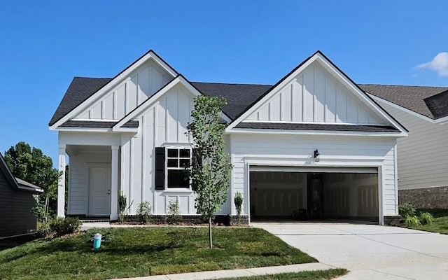 116 Holly Rdg, Antioch, TN 37013 - modern farmhouse featuring board and batten siding, a garage, concrete driveway, a front lawn, and a shingled roof