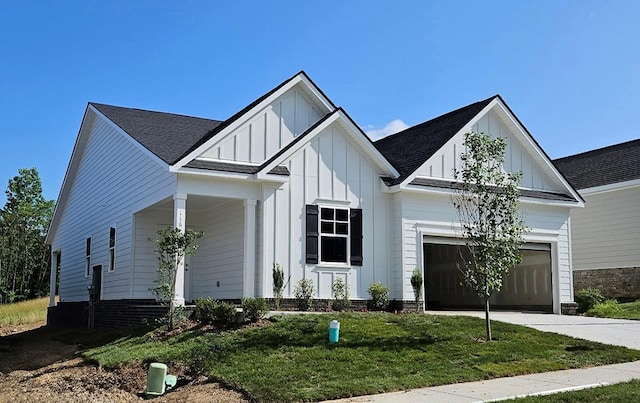 116 Holly Rdg, Antioch, TN 37013 - modern farmhouse with board and batten siding, an attached garage, concrete driveway, a front lawn, and a shingled roof