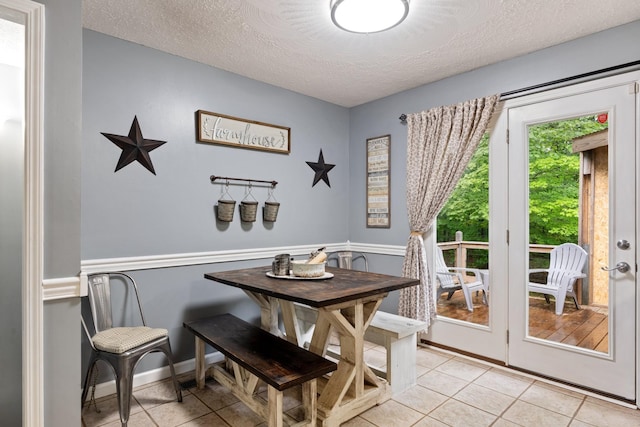 1056 Simms Heights Rd, Kingston Springs, TN 37082 - dining area with a textured ceiling and light tile patterned floors