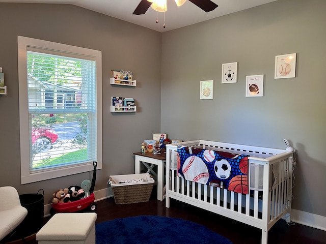 219 Garner St, Springfield, TN 37172 - bedroom featuring baseboards, a nursery area, wood finished floors, and ceiling fan
