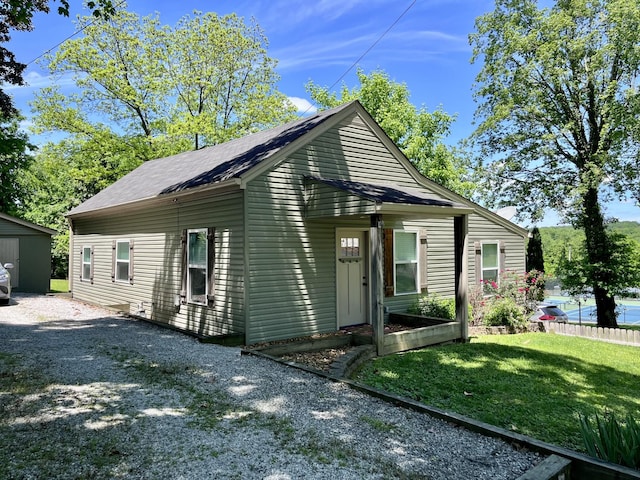 219 Garner St, Springfield, TN 37172 - bungalow-style home featuring a front yard and roof with shingles