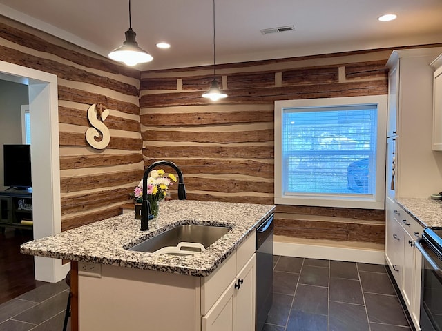 219 Garner St, Springfield, TN 37172 - kitchen with a sink, range, an island with sink, white cabinets, and recessed lighting