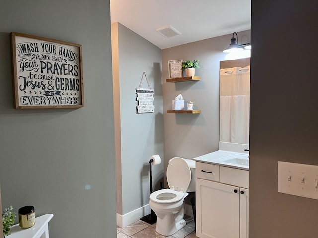 219 Garner St, Springfield, TN 37172 - full bath featuring tile patterned flooring, toilet, vanity, and baseboards