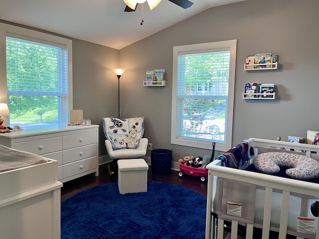219 Garner St, Springfield, TN 37172 - bedroom featuring dark wood finished floors, vaulted ceiling, a crib, and a ceiling fan