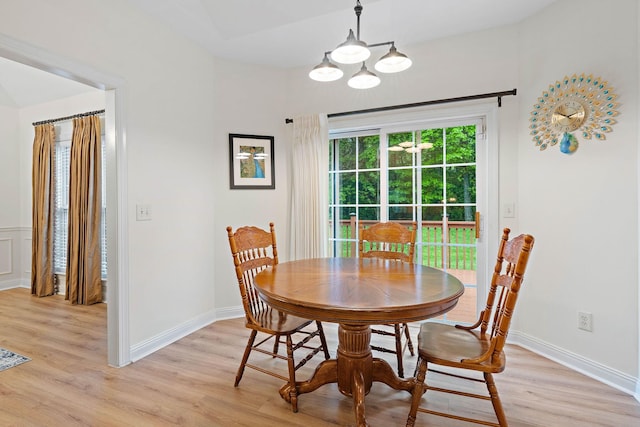 313 Red Feather Ln, Brentwood, TN 37027 - dining area featuring light wood finished floors, a chandelier, and baseboards