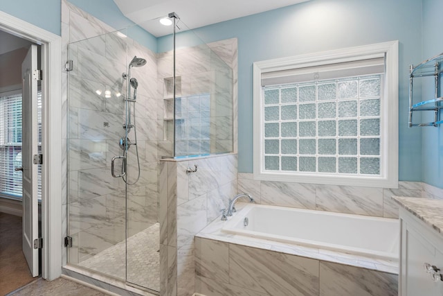 313 Red Feather Ln, Brentwood, TN 37027 - bathroom featuring a stall shower, a bath, and vanity