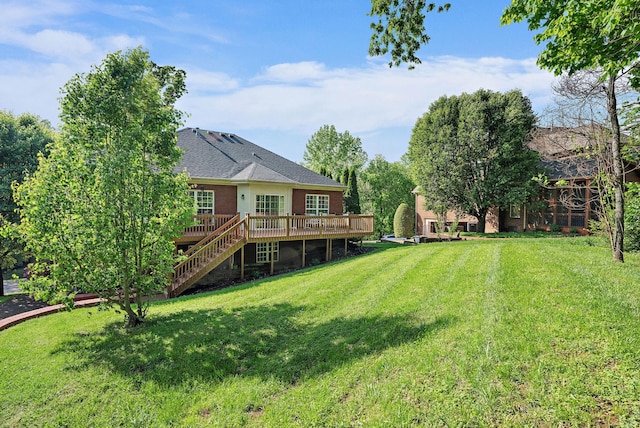 313 Red Feather Ln, Brentwood, TN 37027 - view of green lawn with a wooden deck and stairway