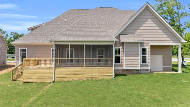 2212 Peterson Dr, Chattanooga, TN 37421 - rear view of house featuring a yard, a deck, a shingled roof, and a sunroom