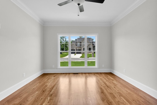 2212 Peterson Dr, Chattanooga, TN 37421 - spare room featuring light wood-style floors, crown molding, and ceiling fan