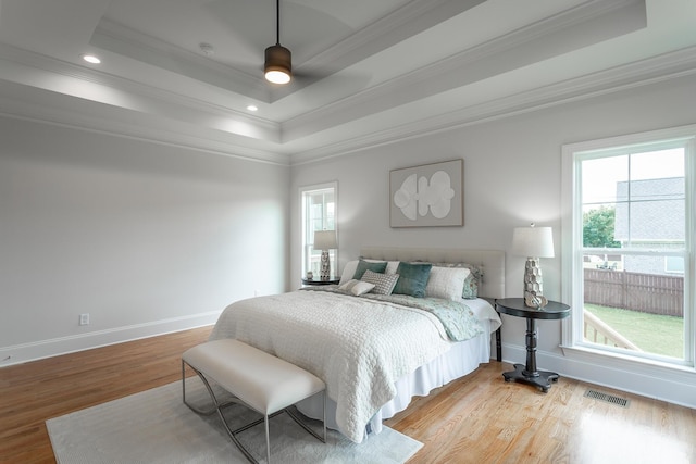 2212 Peterson Dr, Chattanooga, TN 37421 - bedroom featuring ornamental molding, wood finished floors, a raised ceiling, ceiling fan, and recessed lighting