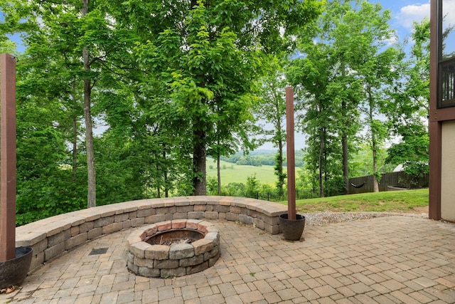1951 Winsome Ln, Adams, TN 37010 - view of patio / terrace featuring an outdoor fire pit and fence