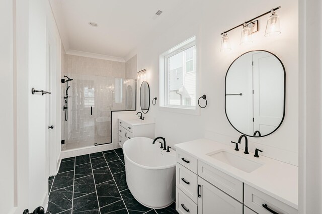 2013 Hector Dr, Thompsons Station, TN 37179 - full bathroom featuring marble finish floors, a stall shower, a freestanding bath, and two vanities