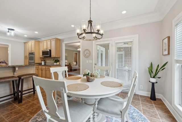 2335 Garrison Cv, Murfreesboro, TN 37130 - dining room featuring ornamental molding, a chandelier, recessed lighting, dark tile patterned floors, and baseboards