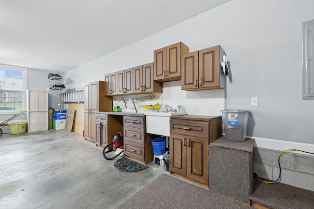 2335 Garrison Cv, Murfreesboro, TN 37130 - kitchen with tasteful backsplash, concrete floors, and light countertops