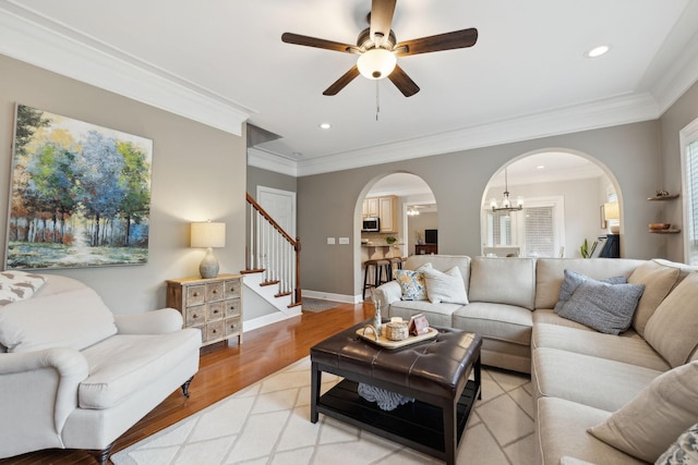 2335 Garrison Cv, Murfreesboro, TN 37130 - living area featuring arched walkways, a ceiling fan, light wood-style flooring, a chandelier, and recessed lighting