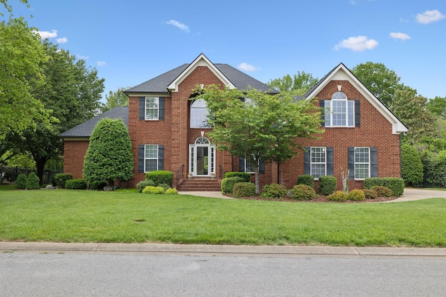 2335 Garrison Cv, Murfreesboro, TN 37130 - colonial house with brick siding and a front yard