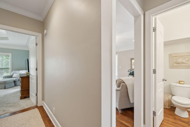2335 Garrison Cv, Murfreesboro, TN 37130 - corridor featuring crown molding, wood finished floors, and baseboards