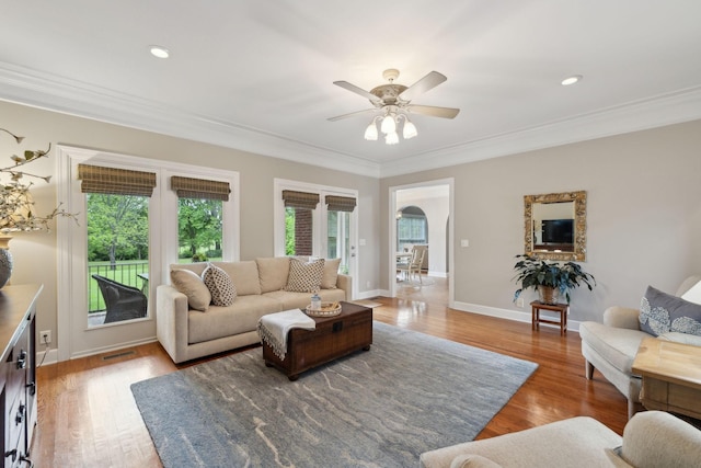 2335 Garrison Cv, Murfreesboro, TN 37130 - living room with crown molding, light wood finished floors, ceiling fan, baseboards, and recessed lighting