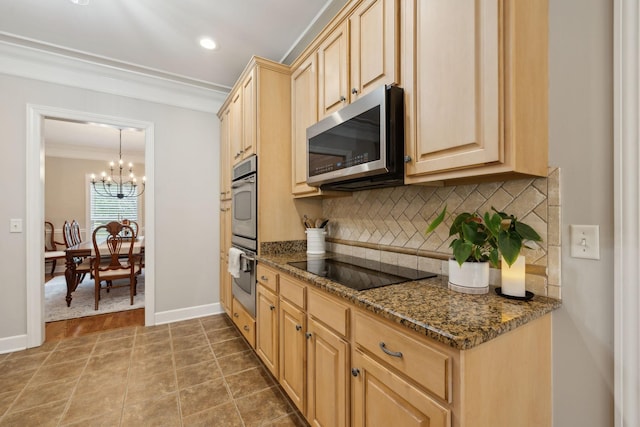 2335 Garrison Cv, Murfreesboro, TN 37130 - kitchen featuring appliances with stainless steel finishes, ornamental molding, light brown cabinets, tasteful backsplash, and a chandelier