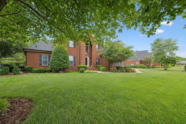 2335 Garrison Cv, Murfreesboro, TN 37130 - view of front of home with brick siding and a front lawn