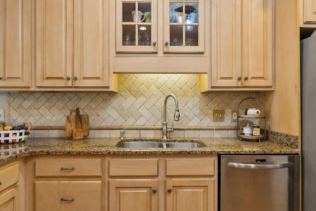 2335 Garrison Cv, Murfreesboro, TN 37130 - kitchen with stainless steel appliances, a sink, glass insert cabinets, dark stone countertops, and backsplash