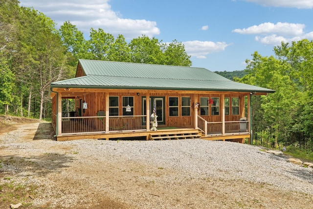 1840 Lick Creek Rd, Hartsville, TN 37074 - chalet / cabin with covered porch and metal roof