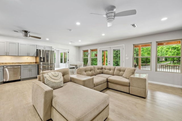 1840 Lick Creek Rd, Hartsville, TN 37074 - living area with a ceiling fan, recessed lighting, light wood-style floors, baseboards, and french doors