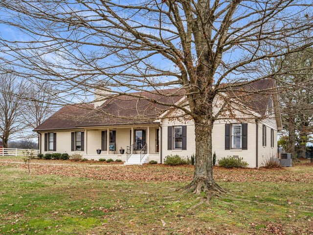473 S Fishing Ford Rd, Petersburg, TN 37144 - single story home featuring brick siding, a porch, and cooling unit