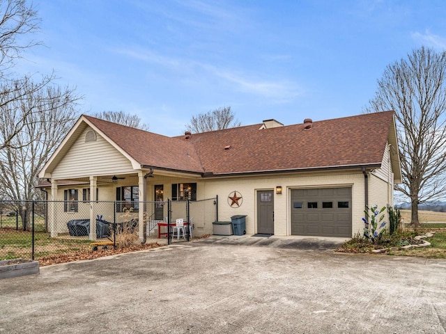473 S Fishing Ford Rd, Petersburg, TN 37144 - ranch-style house with driveway, fence, brick siding, and roof with shingles