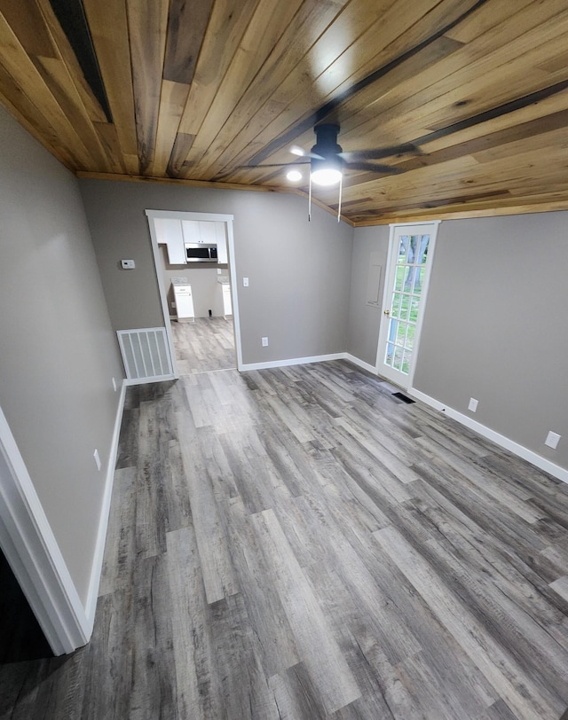 306 Johnson St, Lawrenceburg, TN 38464 - unfurnished room with ceiling fan, wood ceiling, wood finished floors, and baseboards