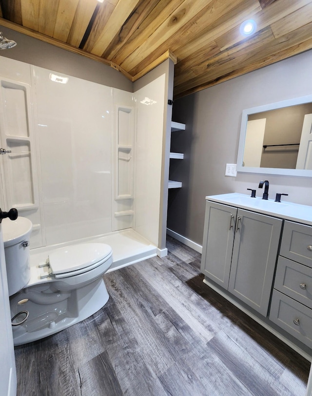 306 Johnson St, Lawrenceburg, TN 38464 - full bath featuring wooden ceiling, toilet, wood finished floors, vanity, and a shower stall
