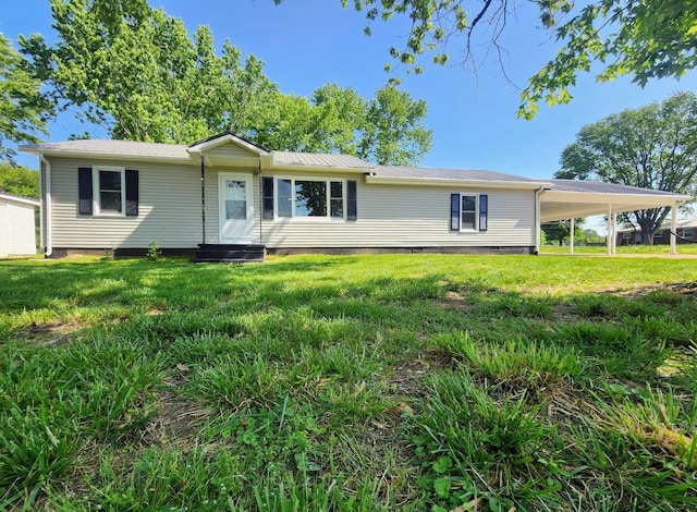 306 Johnson St, Lawrenceburg, TN 38464 - view of front of house with entry steps, a front yard, an attached carport, and crawl space