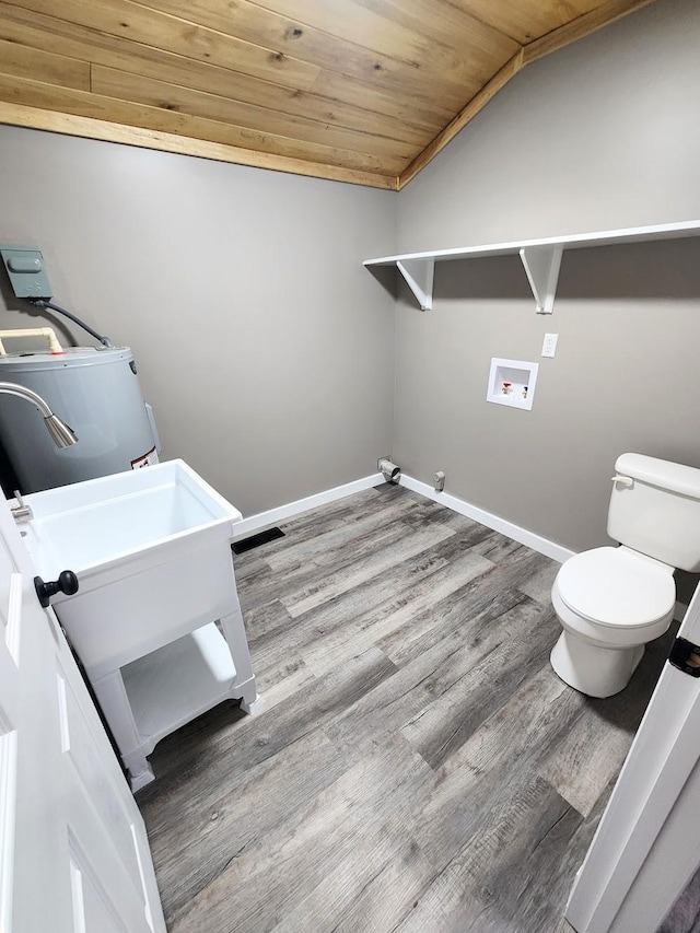 306 Johnson St, Lawrenceburg, TN 38464 - clothes washing area with wood finished floors, wood ceiling, baseboards, and washer hookup